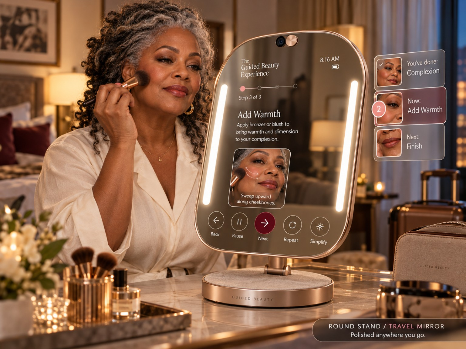 A silver-haired woman follows a guided mirror step applying cheek color